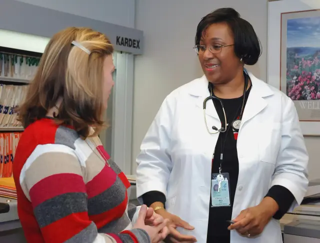 CVA physician consulting with a patient